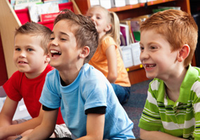 young boys laughing during school time young boys laughing during school time